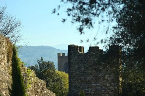 The old wall of Florence, surrounded by trees. Stock Photos