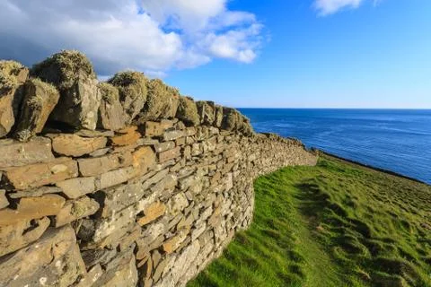 Old wall on isolated island Stock Photos