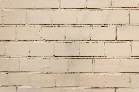 Old Wall Made Of Red Brick, Painted White In Loft Style. Background of white Stock Photos