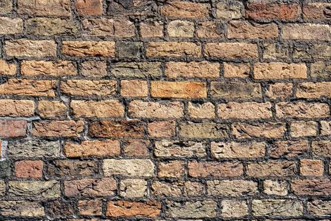 Old wall made of red clinker bricks Stock Photos