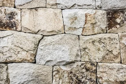 Old wall made of stone. Stock Photos