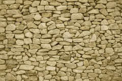 Old wall made of stone. Stock Photos