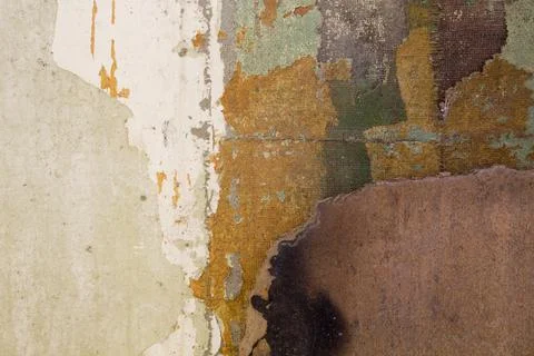Old wall with peeling wallpaper Stock-Fotos