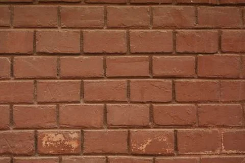 Old wall of red and orange bricks for texture, or background Stock Photos