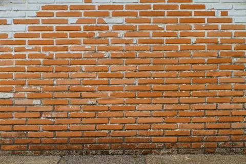 Old wall from a red brick Stock Photos