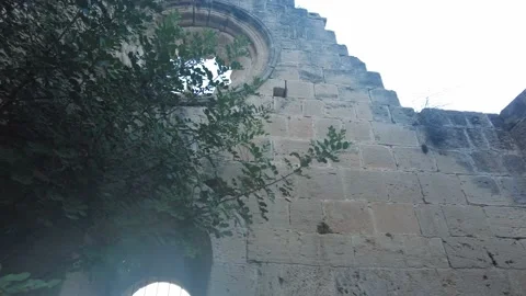 The old wall of the ruined monastery, bricks and stylishly designed monastery Video stock 234209295