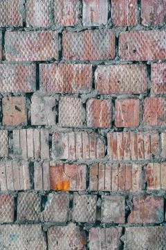 The old wall of a square red brick Stock-Fotos