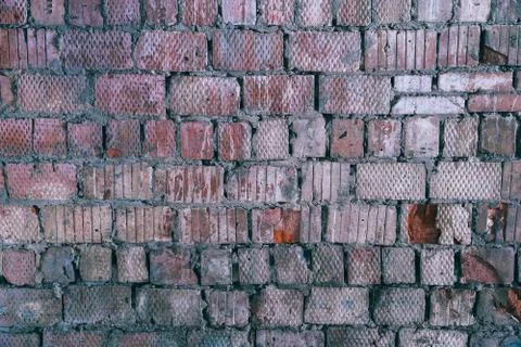 The old wall of a square red brick 스톡 사진