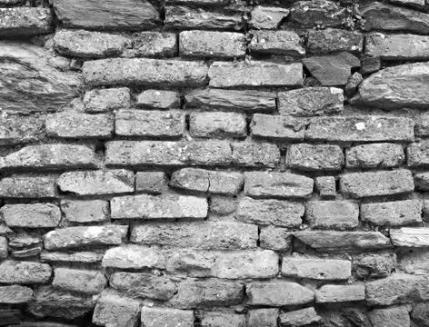 Old wall of stone bricks background Stock Photos
