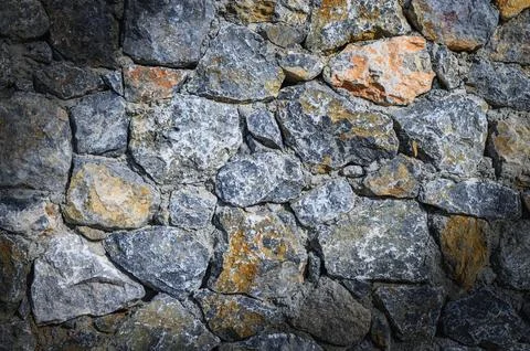 Old wall of stone shell rock of arbitrary shape. isolated image Stock Photos