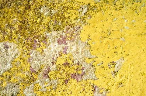 The old wall surface is yellow with irregularities and roughness Stock Photos