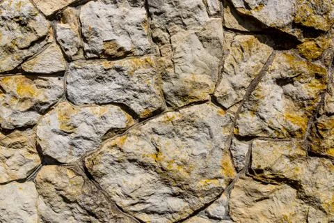 Old wall of wild stone, texture Foto stock
