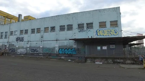 Old Warehouse Building with Graffiti Stock Footage 92453692