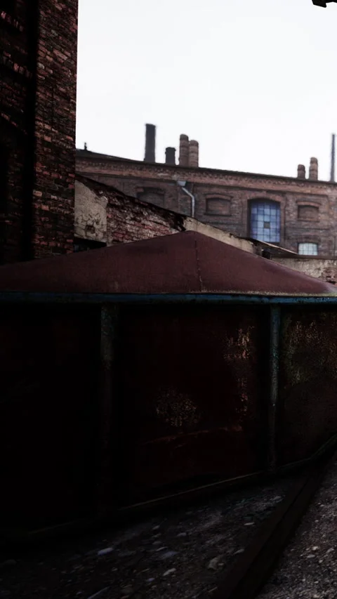 Old warehouse structure near a body of water during cloudy weather Stock Footage 343156618