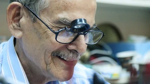 Old Watchmaker working in his shop. Close Up Stock Footage 81528911
