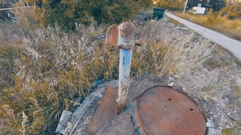 An old water column. Rusty. For a long time does not work. 스톡 동영상 94036252