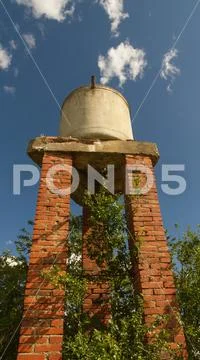 Old Water Deposit on Pillars of Bricks Stock Photos