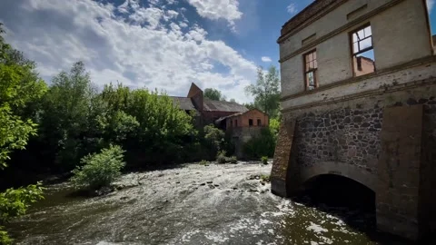 Old water mill on a mountain river. Beautiful old architecture Stock Footage 195000358