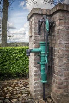 Old water pump. Stock Photos
