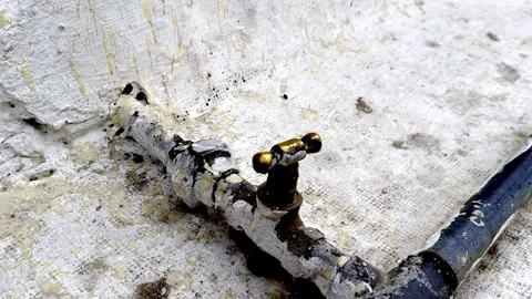 Old Water Supply Pipe on Rooftop Stock Footage 333609130
