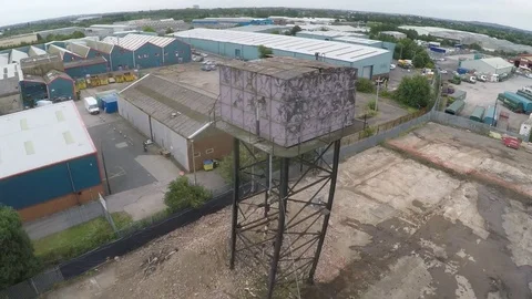 Old Water tower crashing down demolition Stock Footage 84760039