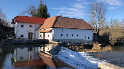 Old Watermill with a dam Stock Footage 145718381