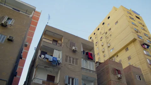 Old weathered apartment blocks in a Middle Eastern city Video stock 306027300