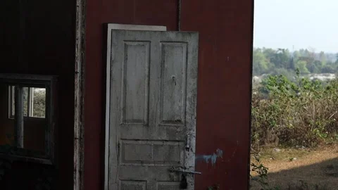 Old weathered door on rusty metal wall of abandoned building Stock-Footage 330706341