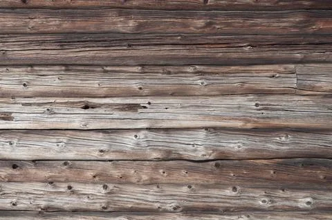 Old weathered log wall background Stock Photos