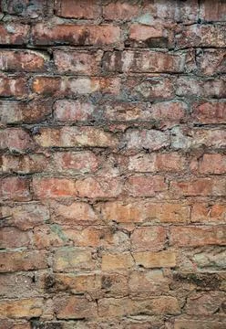 Old weathered red Brick wall. Vintage texture Background. Stock Photos