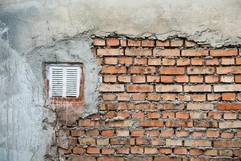 Old weathered red Brick wall. Vintage texture Background. Stock Photos