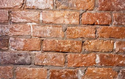 Old weathered red brick wall as creative background Stockfoto's