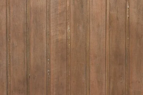 Old weathered rough plank barn wall. Stock Photos