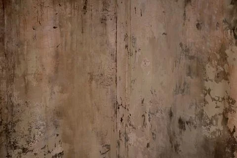 Old weathered rough white wall weathered in the apartment as a background, .. Stock Photos