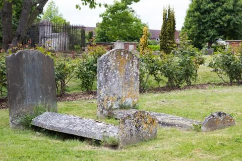 Old weathered tombs in graveyard Stock Photos