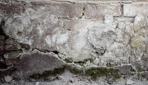 Old weathered wall gray colored. Vintage texture Stock Photos