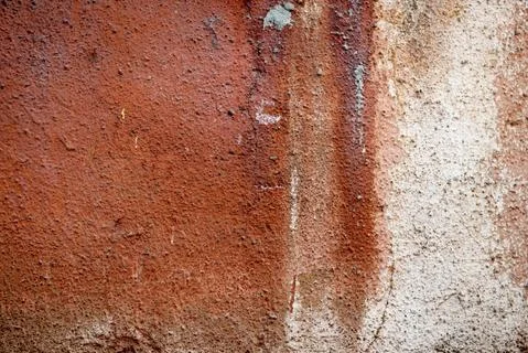 Old weathered wall painted orange. Vintage texture Stock Photos