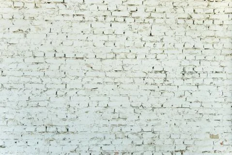 Old weathered white brick wall. Vintage texture Background. Stock Photos