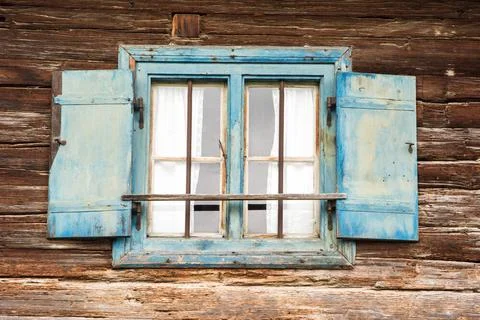 Old weathered widow Old weathered widow of a traditional farm house Copyri... Stock Photos