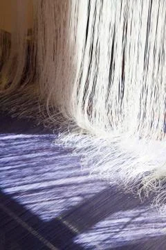 Old weaving Loom and thread of yarn. Stock Photos