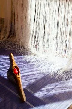 Old weaving Loom and thread of yarn. Stock Photos