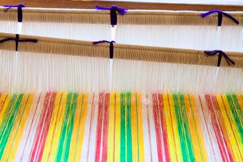 Old weaving Loom and thread of yarn. Stock Photos
