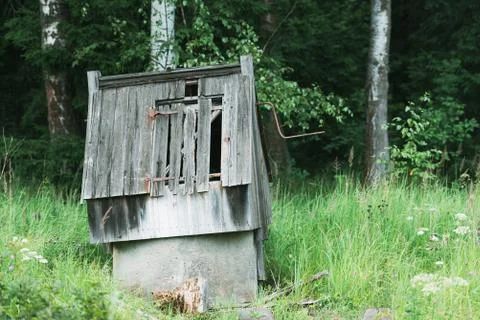 Old well at the edge Stock Photos