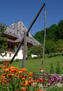 Old well in front of a monastery Stock Photos