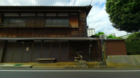 An old well placed at storefront of nostalgic flower shop in Tokyo Japan. Stock Footage 218259530