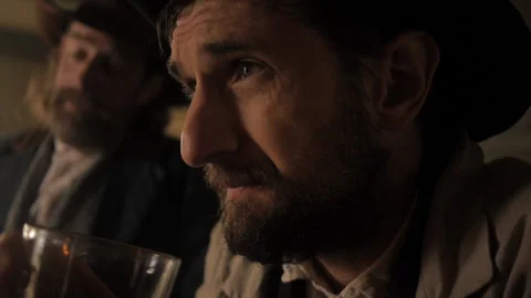 Old Western Bar and Bartender - Cowboys and Outlaws drinking Stock Footage 158714534