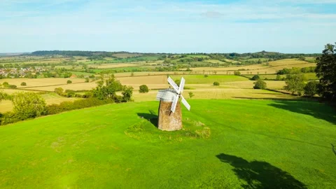 Old wheat windmill for traditional flour milling. Small historic stone grain Stock Footage 346812178