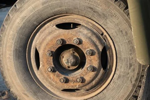 Old wheel with a rusty disc Stock Photos