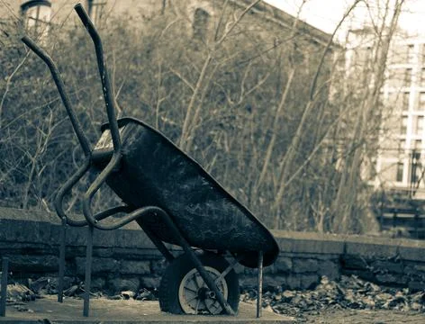 Old wheellbarrow Stock Photos