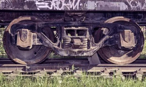 Old wheels on freight wagon Stock Photos